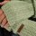 Knit Factory Nica Armstulpen Sage Green One Size Gestreift